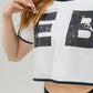 NEBBIA OVERSIZED CROP TOP GAME ON 610